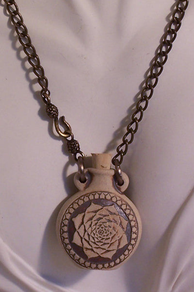 Raku Lotus Design on Antique Brass